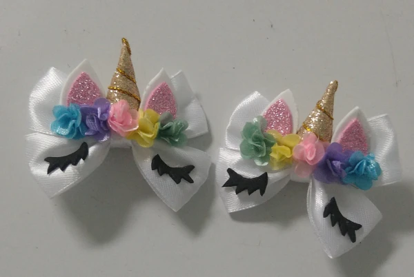 Hebillas unicornio (par)'s foto | Creaciones Mi Bella Elena |  BizneCubano