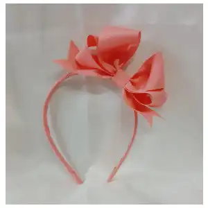 Cintillo.boutique sentado miniatura 1